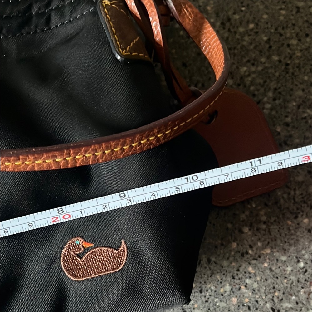 Dooney & Bourke Black Handbag with Brown Leather Strap and Hot Pink Interior - Picture 16 of 16